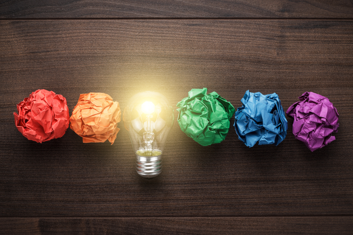 Great,idea,concept,with,crumpled,colorful,paper,and,light,bulb